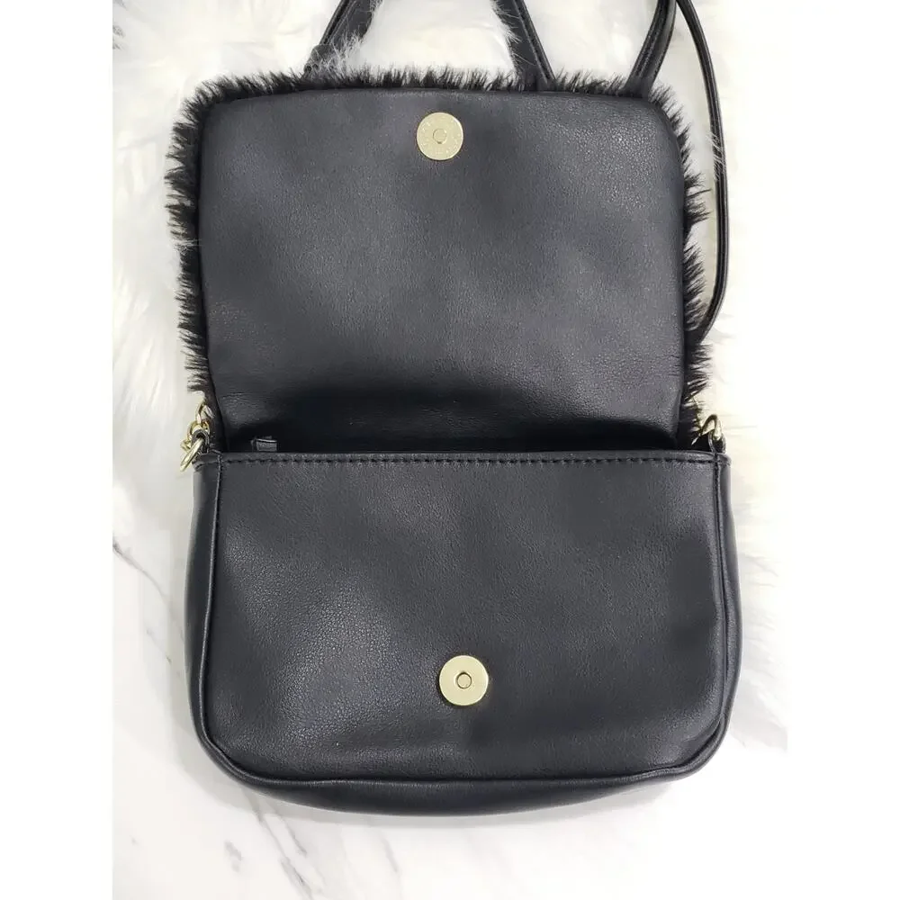 Juicy Couture measures approx